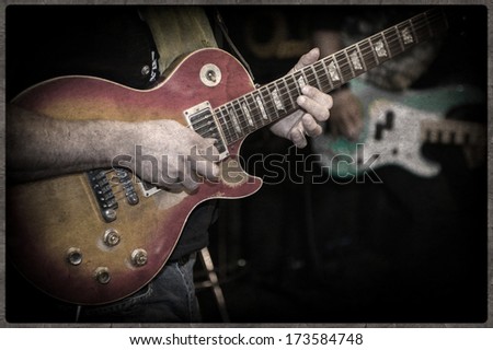 Grunge and Vintage,, defocus, guitarist during the live performance on stage