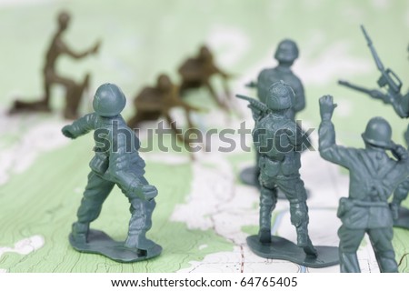 Plastic Army Men Fighting on Map. The map is by U.S. Geological Survey and in the public domain.