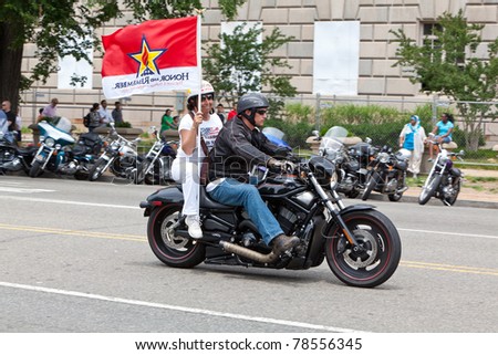 WASHINGTON, DC, USA - MAY 29: Motorcycles travel down Constitution Avenue as part of the annual Rolling Thunder motorcycle ride for American POWs and MIA soldiers. May 29, 2011 in Washington, DC, USA