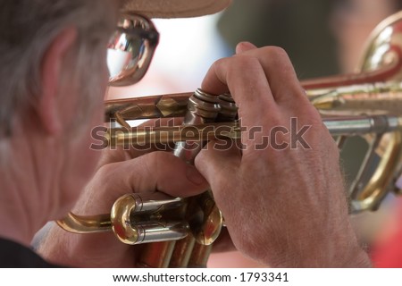 Middle-Aged Man Playing Trumpet