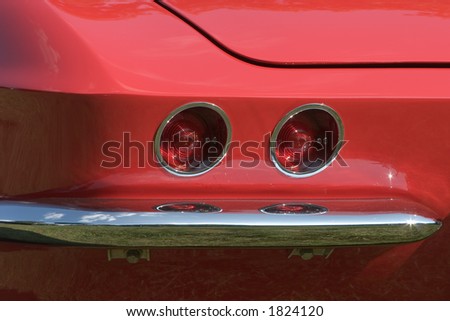 Rear Tail Lights of Red Corvette