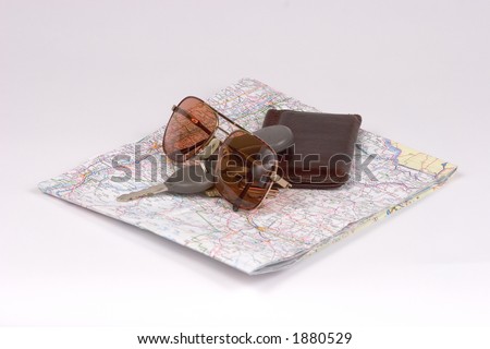 Isolated Wallet, Keys & Brown Sun Glasses on Map