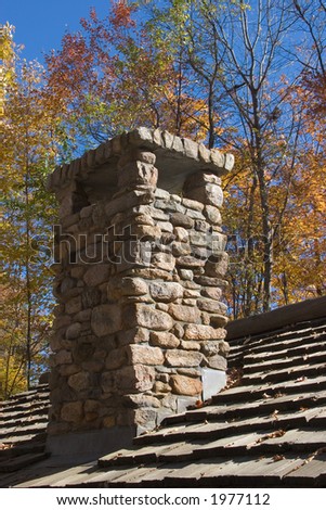 Stone Chimney on Rustic Cabin
