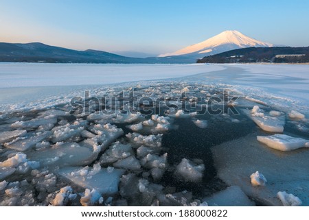 Sunrise of Frozen Lake with Mount Fuji at Yamanaka Lake, after the heavy snow storms in the past 120 years in 20 February 2014