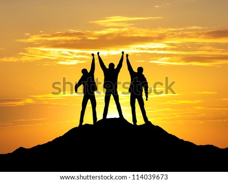 Silhouette of team on the top. Sport and active life