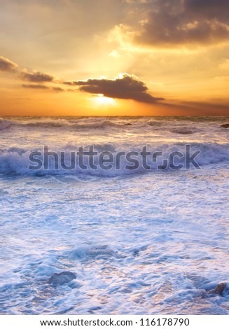 Waves and sundown. Natural composition