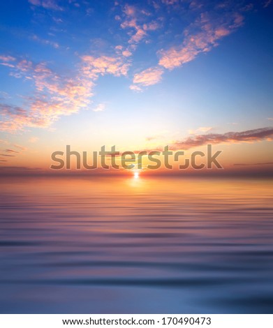 Sky and reflection in the water. Beautiful abstract seascape
