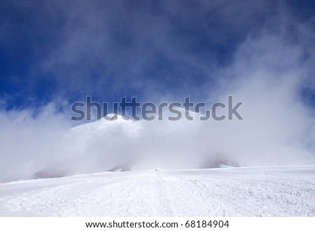 White cloud in snow mountain high. Natural composition