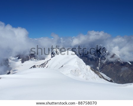 Mountain declivities with snow. Natural composition