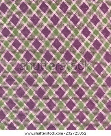 Retro geometric pattern texture. Fabric background. Vintage concept or conceptual old retro aged fabric. Shades of green, pink and purple