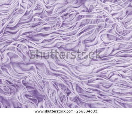 Fur texture. Abstract backgrounds. Boho, bohemian, retro, vintage style. Purple, dark pink, violet color carpet. Soft pastel color