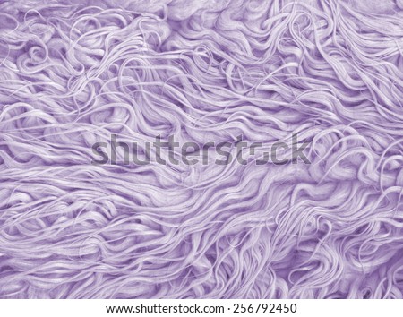 Fur texture. Abstract backgrounds. Boho, bohemian, retro, vintage style. Purple, dark pink, violet color carpet. Soft pastel color