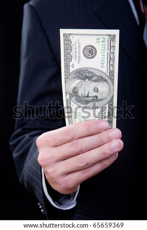 Man\'s hands with money