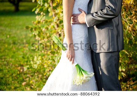 stock photo wedding theme holding hands newlyweds