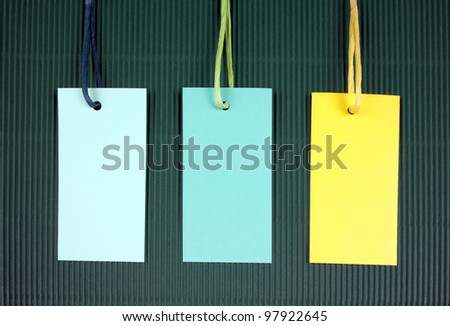Price tag or address label with string on corrugated cardboard