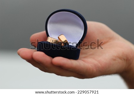 Engagement rings or present in the hands of a man