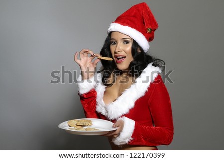 Sexy Santa eating cookies