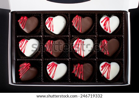 White and Dark Chocolate Red Velvet Cake Bites in a box for Valentine\'s Day