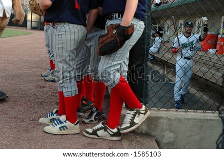 Ball players contrasted with professional player.