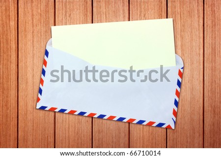Envelope, letter with blank Brown paper on old wood