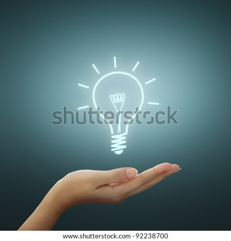 Bulb light drawing idea on woman hand