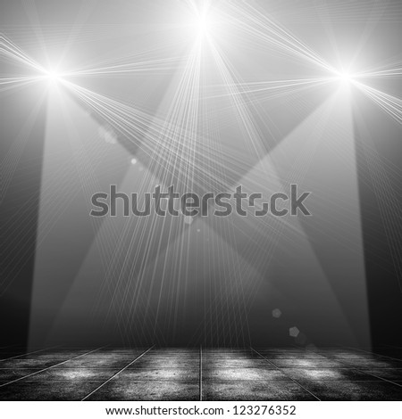 concert spot lighting over dark background and tile floor