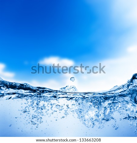 Water and air bubbles over sky background
