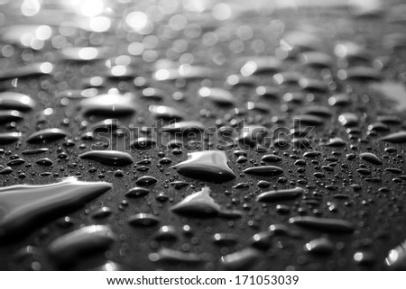 Water drops on metal surface. Abstract background