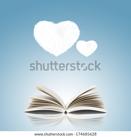 Open book and heart shape clouds isolated on blue background