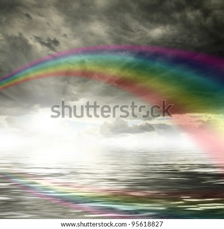 Sky background with rainbow and reflection in water. Sunset