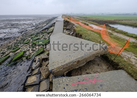 Sea wall smashed by the power of the sea on Mersea Island.