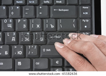 isolated keyboard and fingers with push key enter