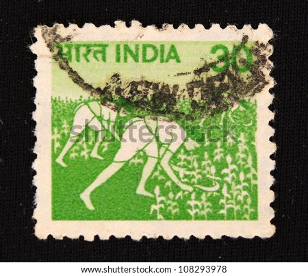 INDIA - CIRCA 1972: A stamp printed in India shows Cropland harvested, circa 1972