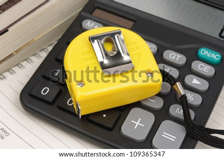 Ruler and calculator (Housing construction or renovation prices concept)