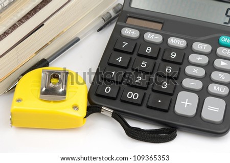 Ruler and calculator (Housing construction or renovation prices concept)