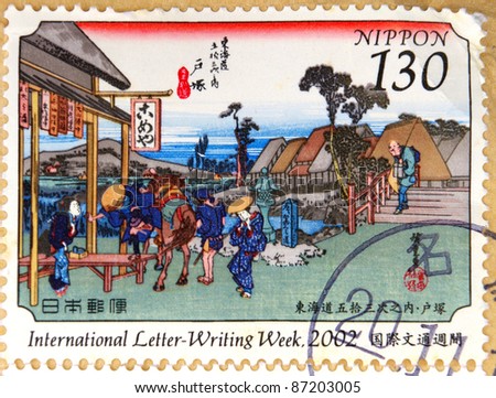 JAPAN - CIRCA 2002: A stamp printed in Japan shows Village Life, circa 2002