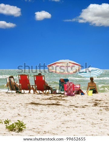 A day at the beach in sunny Florida featuring gentle waves and a bright blue sky.