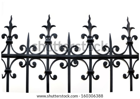part of a wrought iron fence on white background