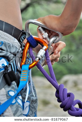 fixation with snap hook for abseiling