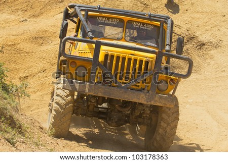 MOHELNICE, CZECH REPUBLIC - MAY 20. Unidentified racer at yellow truck leaves steep slope in the 