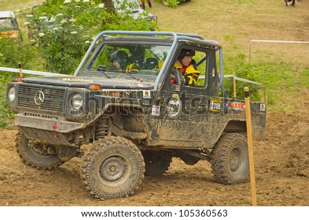 MOHELNICE, CZECH REPUBLIC - JUNE 10. Unidentified racer at off-road car leaves steep slope in the 