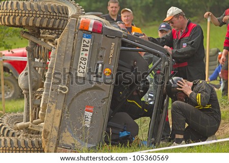 MOHELNICE, CZECH REPUBLIC - JUNE 10. Unidentified racer flipped his car on its side  in the \