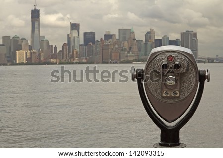 Coin operated binoculars with Lower Manhattan on the background (New York City)