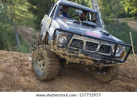 MOHELNICE, CZECH REPUBLIC - OCT 05. Black off-road car on a difficult terrain on a trial race in the 