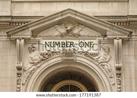 The facade of the building with the inscription NUMBER ONE above the entrance