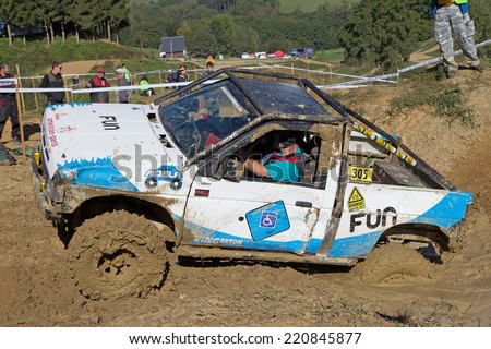 MOHELNICE,  CZECH REPUBLIC - SEPT 28: Off road car overcomes a deep pool of water in the BIG SHOCK! CUP of the Czech Republic. On September 28, 2014  in MOHELNICE, Czech Republic.