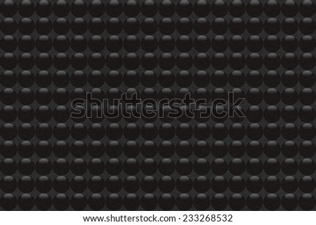 Pattern of gold  metal background with black balls.