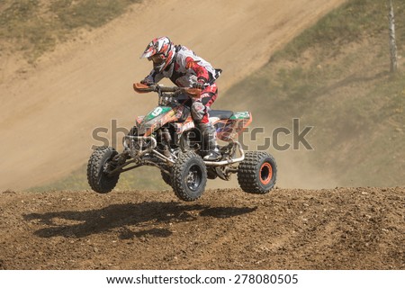 MOHELNICE, CZECH REPUBLIC - APRIL 25. Racer is jumping a quad bike in the \