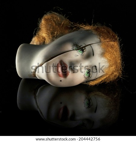 Creepy doll head