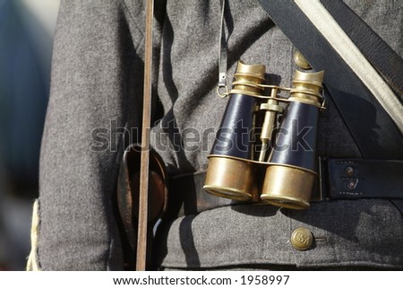 Civil War reenactment officer with spyglass and sword